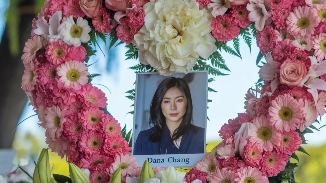 Memorial tribute for Dana Chang with flowers and a serene background.